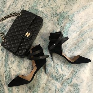 Beautiful black heels with leather strap. Size 6.5